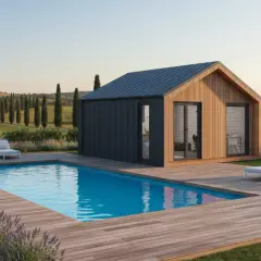 Modern prefab house with pool and lounge chairs in a Tuscan landscape.