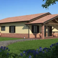Una casa prefabbricata moderna con tetto in tegole rosse, portico in mattoni e un vialetto in legno su un prato verde.