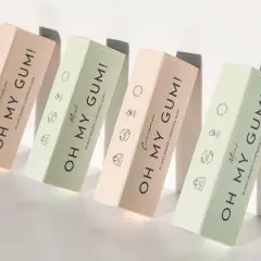 Scatole di gomma da masticare "Oh My Gum!" in tonalità pastello. La gomma da masticare è biodegradabile, un'ottima scelta per l'ambiente.