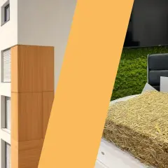 Blocchi di paglia compressa, pronti per l'isolamento, accanto a un edificio moderno con rivestimenti in legno.