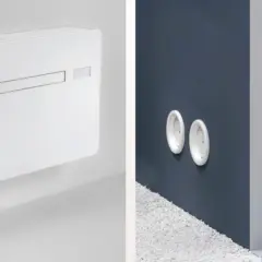 Condizionatori senza unità esterna: come funzionano. Immagine mostra un'unità interna bianca e due bocchette a muro.