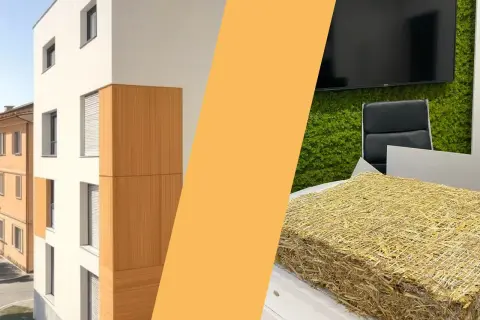 Blocchi di paglia compressa, pronti per l'isolamento, accanto a un edificio moderno con rivestimenti in legno.