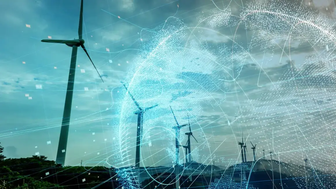 Wind turbines on a hill with a digital globe overlay and data points.