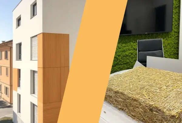 Blocchi di paglia compressa, pronti per l'isolamento, accanto a un edificio moderno con rivestimenti in legno.